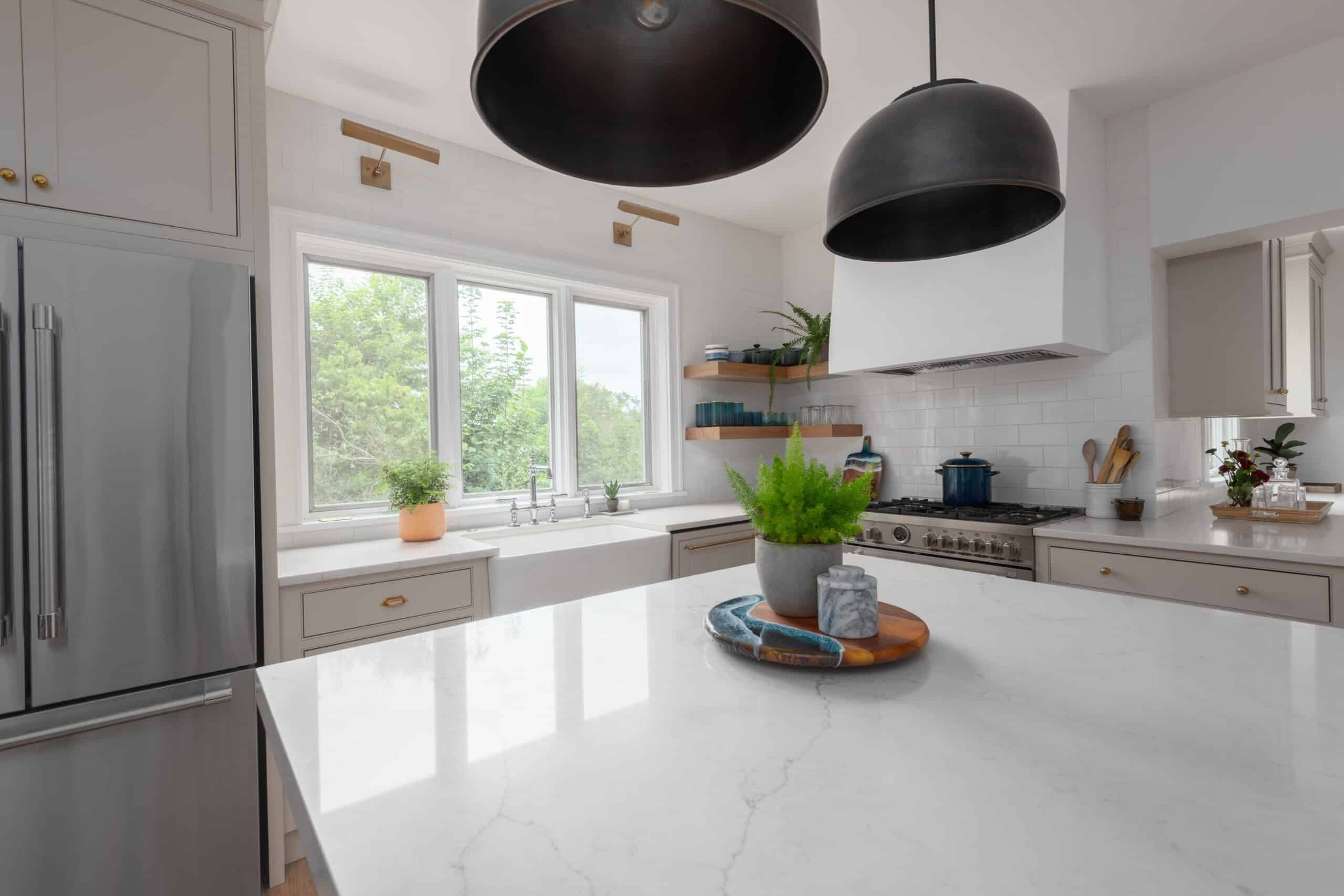White Countertop with Green Plant Hill & Harbor Design